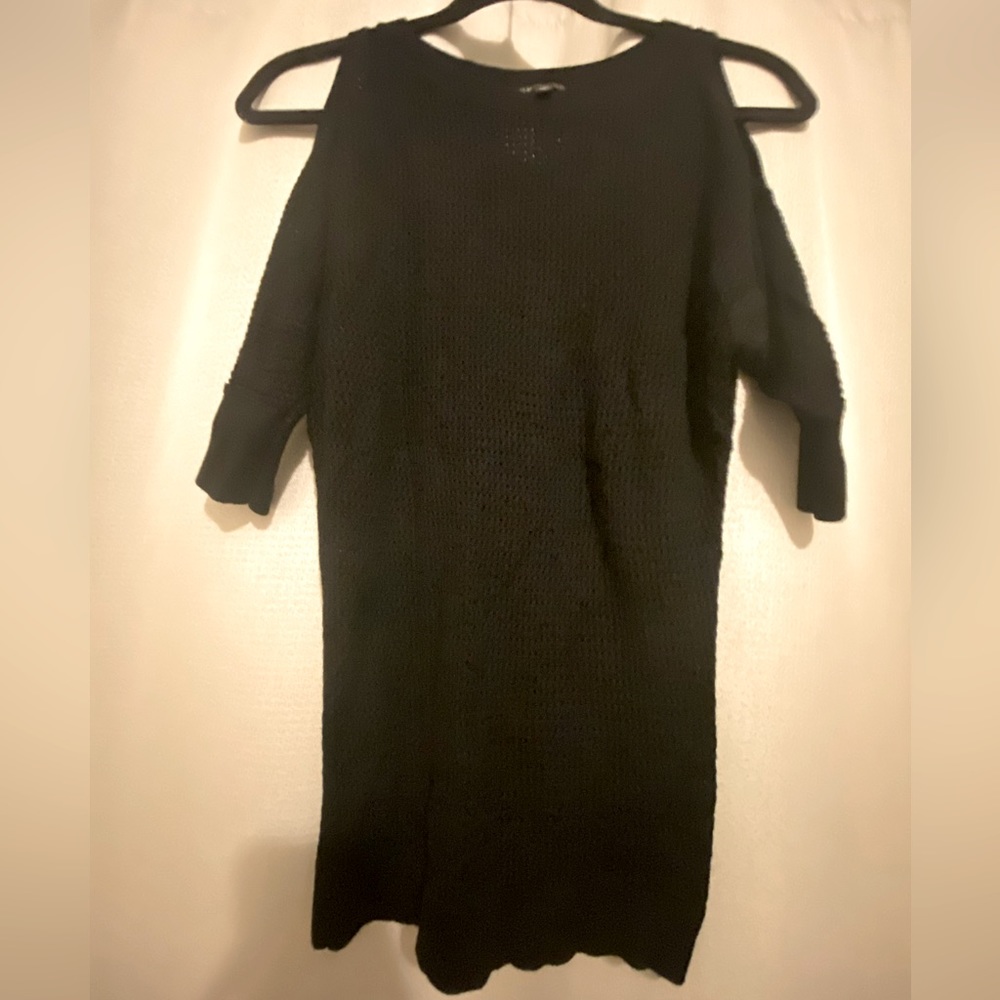Express Woman’s black XS knitted sweater with open shoulders. No marks or tears